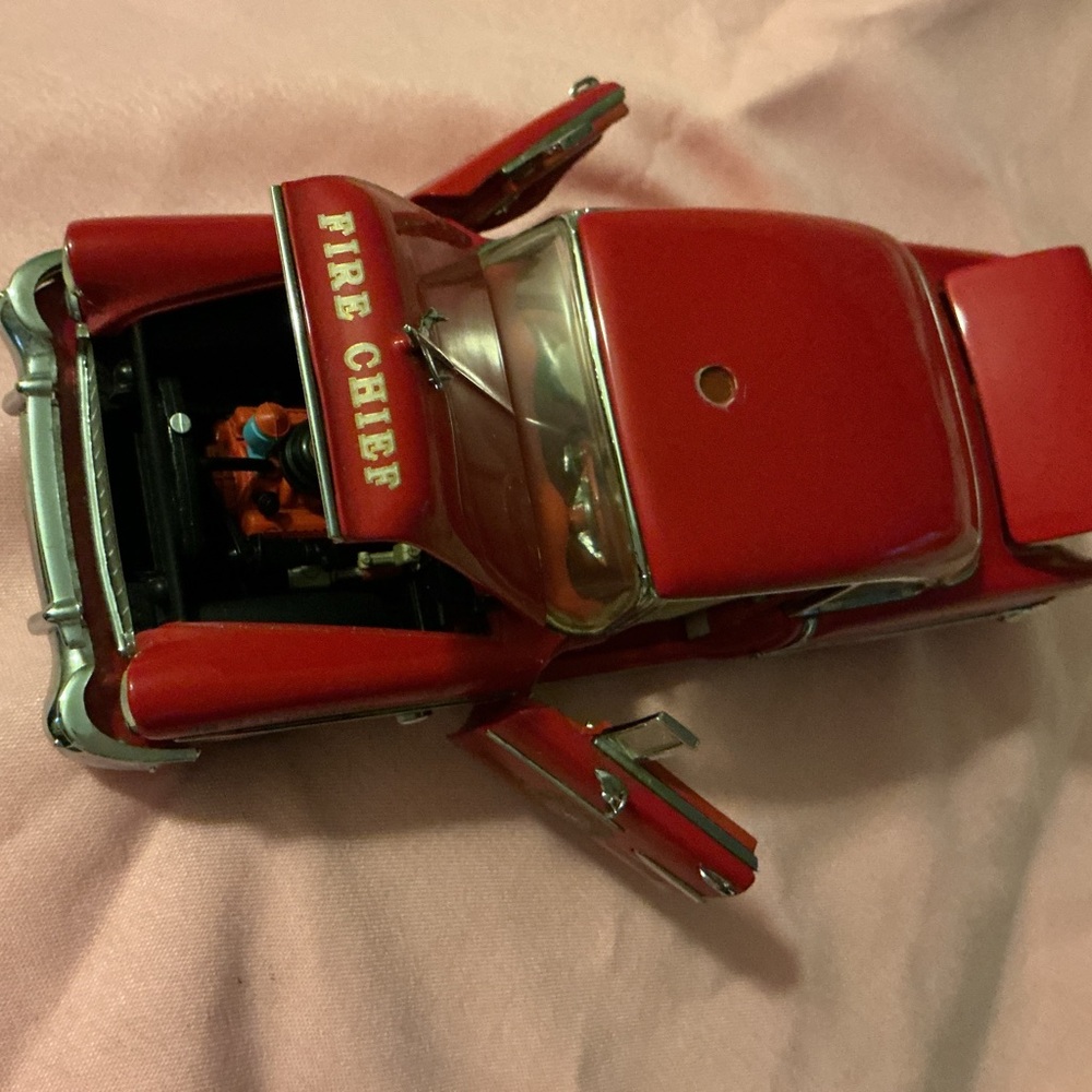 1955 Chevrolet Chevy BelAir Fire Chief Car, red with Fire Chief emblem.